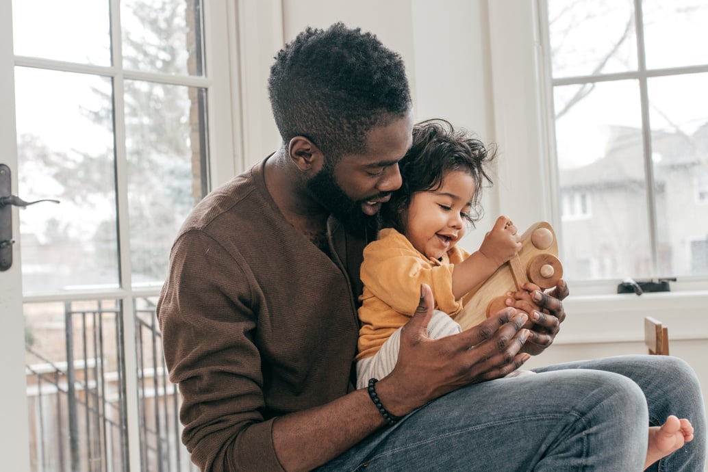 Dad and kid at home